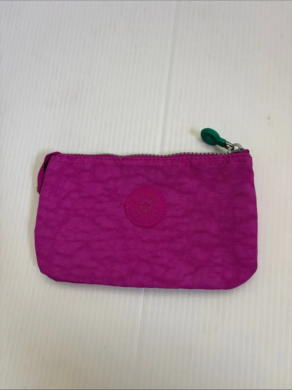 🌸 Kipling Monogram “A” cosmetic pouch